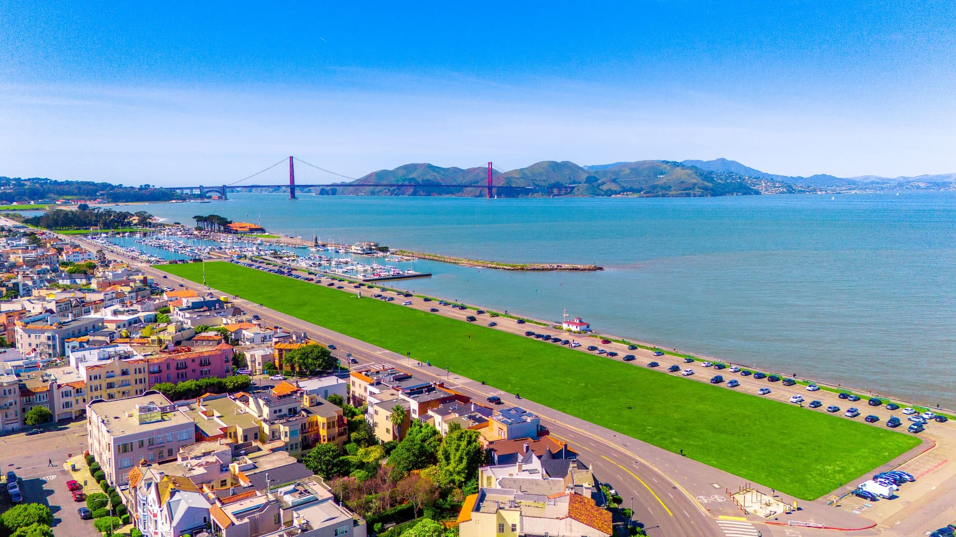 Aerial view over the Marina District and marina toward the Golden Gate Bridge